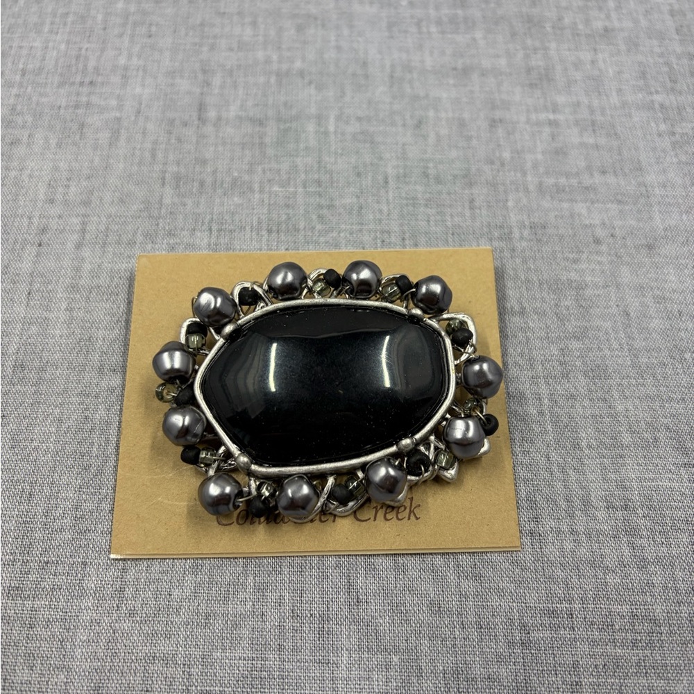 Chic Black and Silver Brooch with Pearl Accents